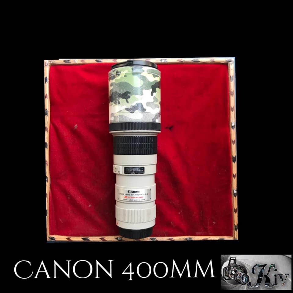Canon 400mm, for AF motor replacement.